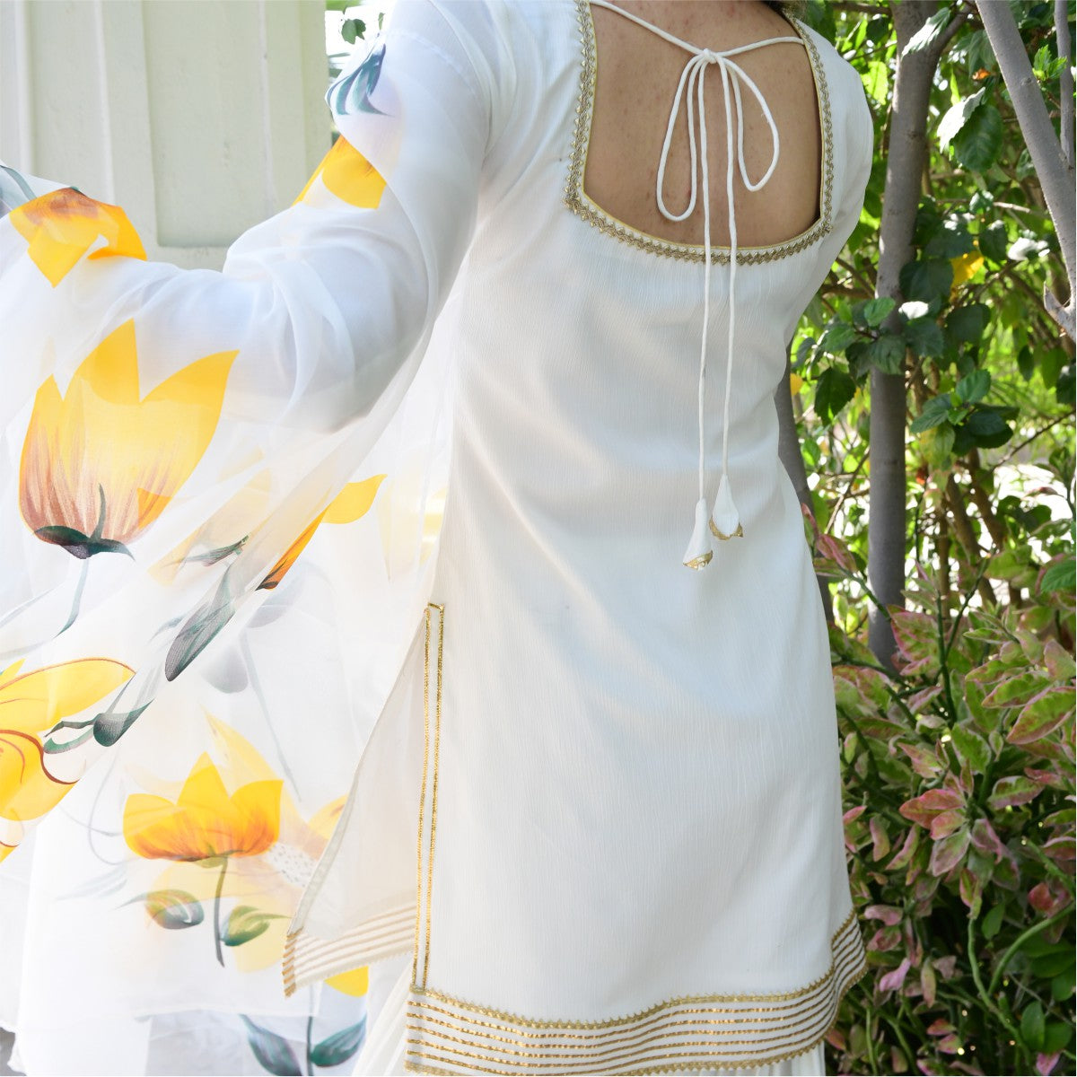 White Kurta And Sharara Set